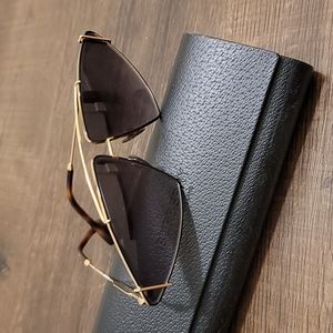 Burberry gold plated triangular sunglasses